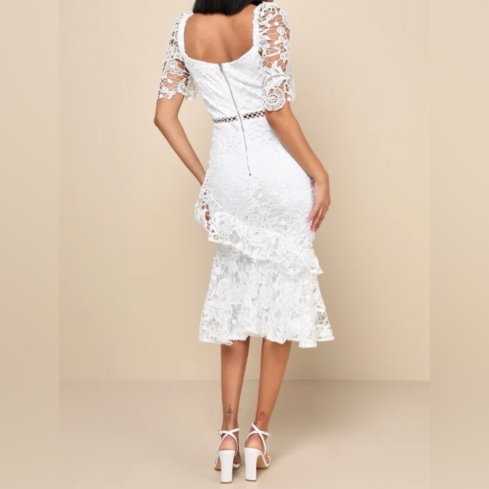 Pretty white dress for special occasion. New with tag.